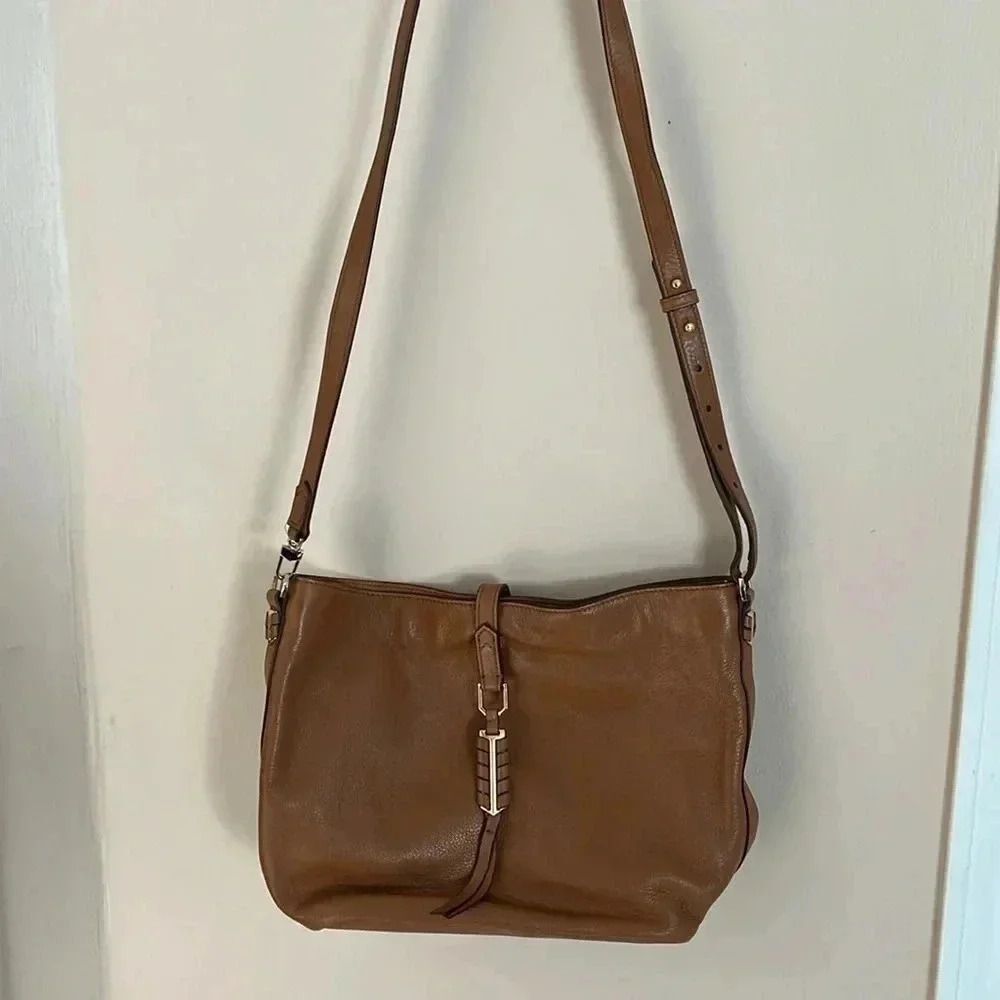 Covet leather  crossbody purse